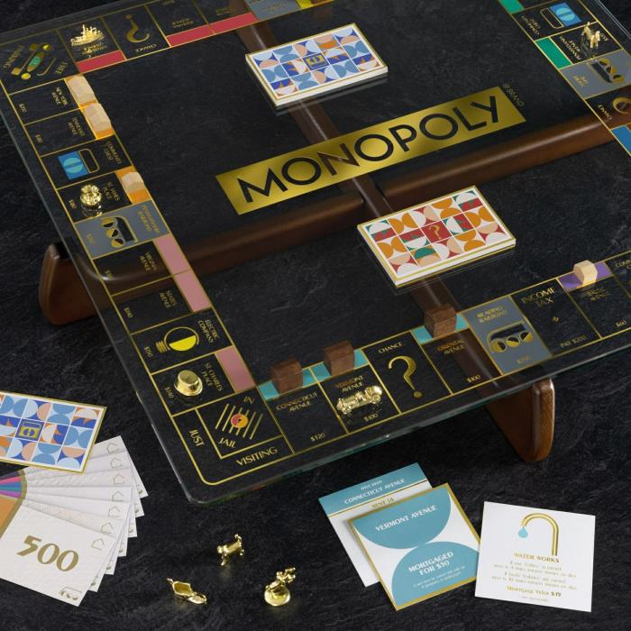 General |   Monopoly – Glass Prisma Board Games General